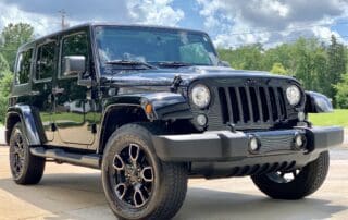 front shot of black jeep with ceramic coating by Abundance Auto detail in Murfreesboro