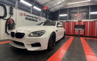 front shot of white bmw by Abundance Auto Detail in Murfreesboro