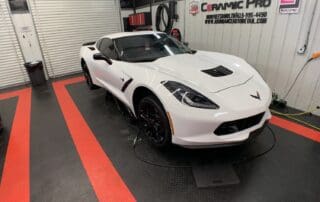 white corvette getting washed