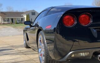 rear shot fo black corvette