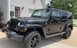black jeep with ceramic coating by Abundance Auto detail in Murfreesboro